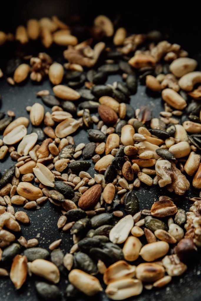 A visually appealing mix of roasted nuts and seeds for culinary and health purposes.